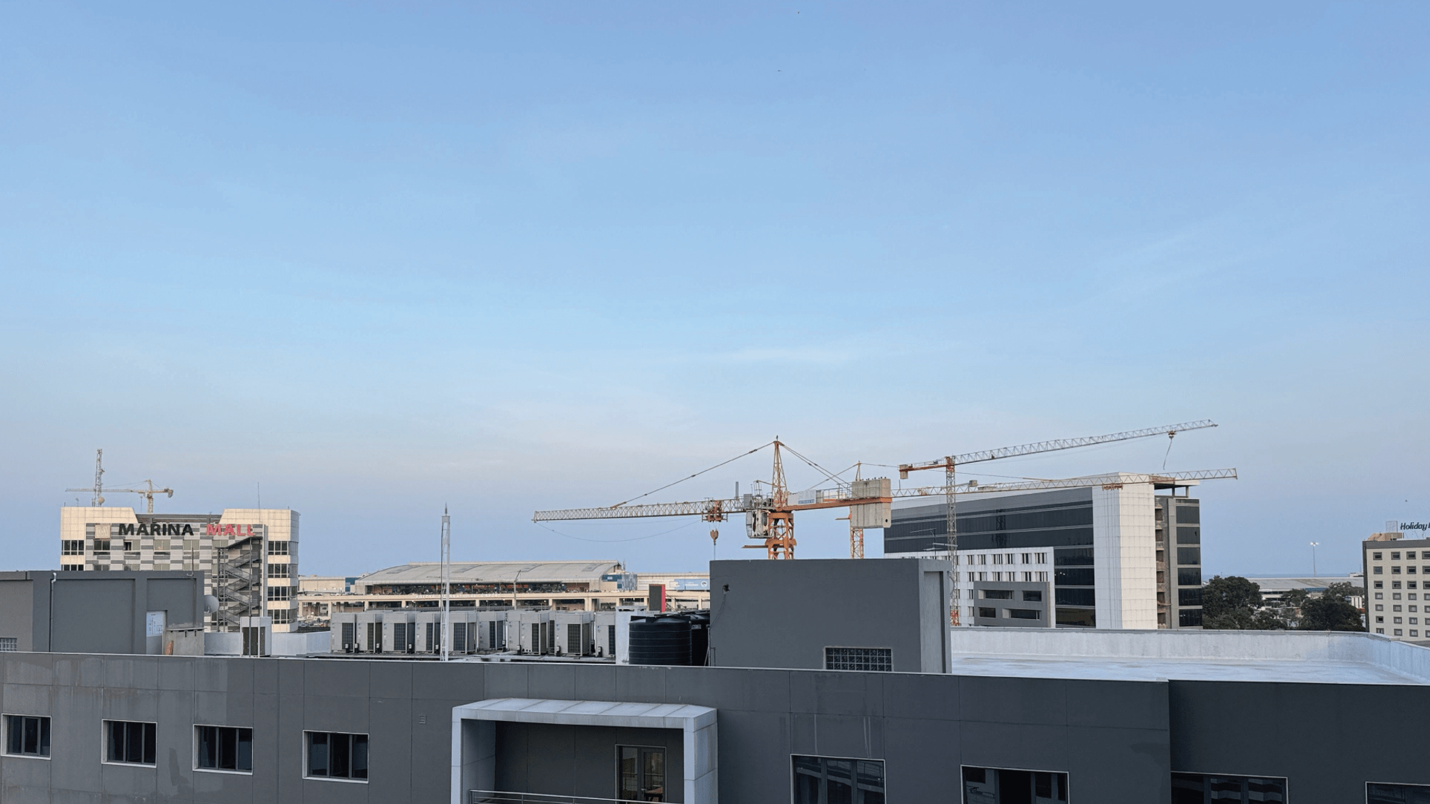 Construction site on office block rooftop Construction site on office block rooftop